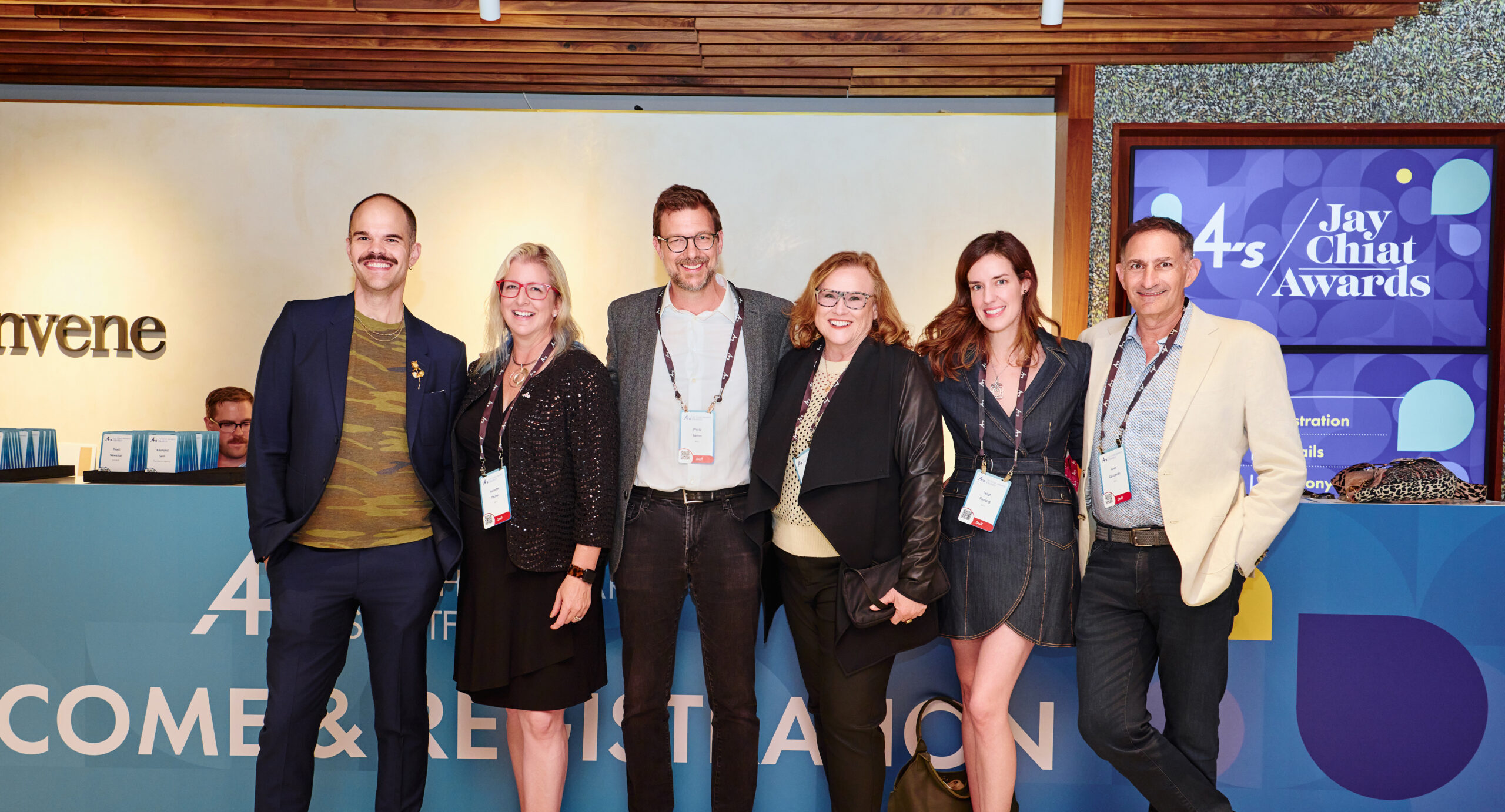 Group photo of conference attendees, all smiling at the camera at the 4As Jay Chiat Awards
