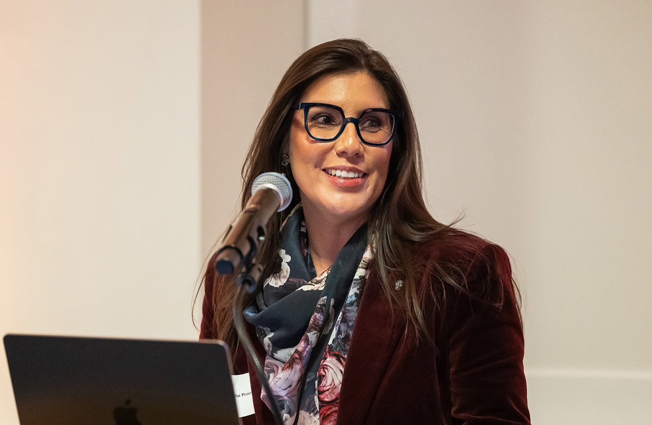 Female speaker on stage