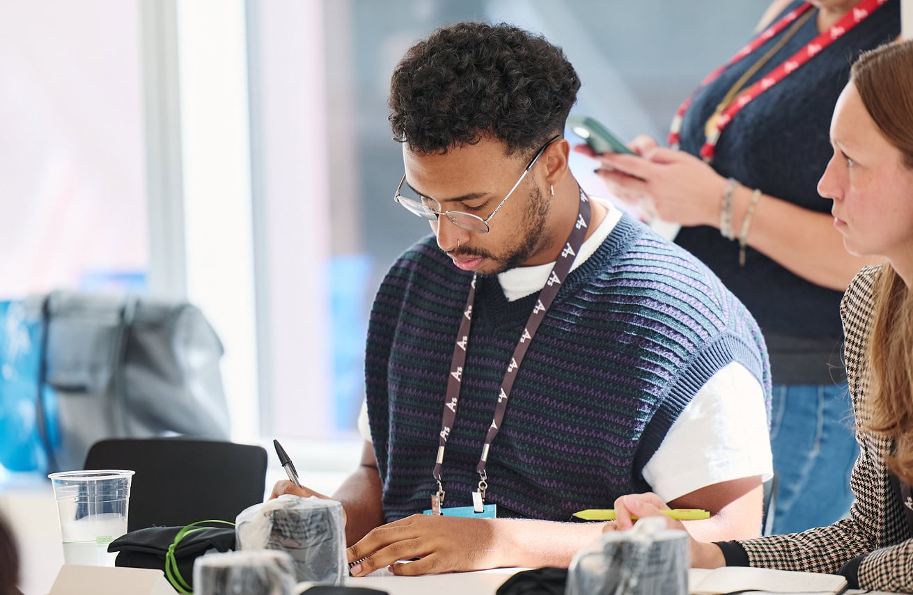 Man writing down information