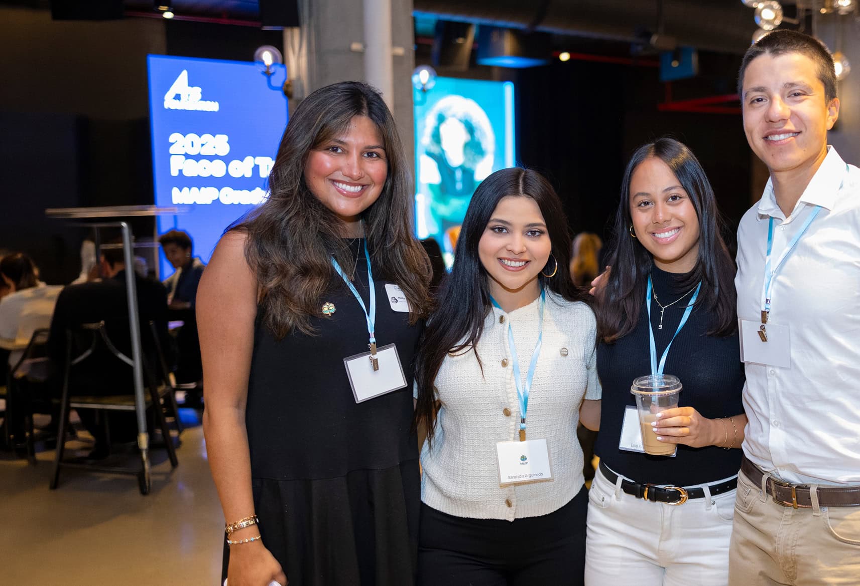 Group of people smiling at event